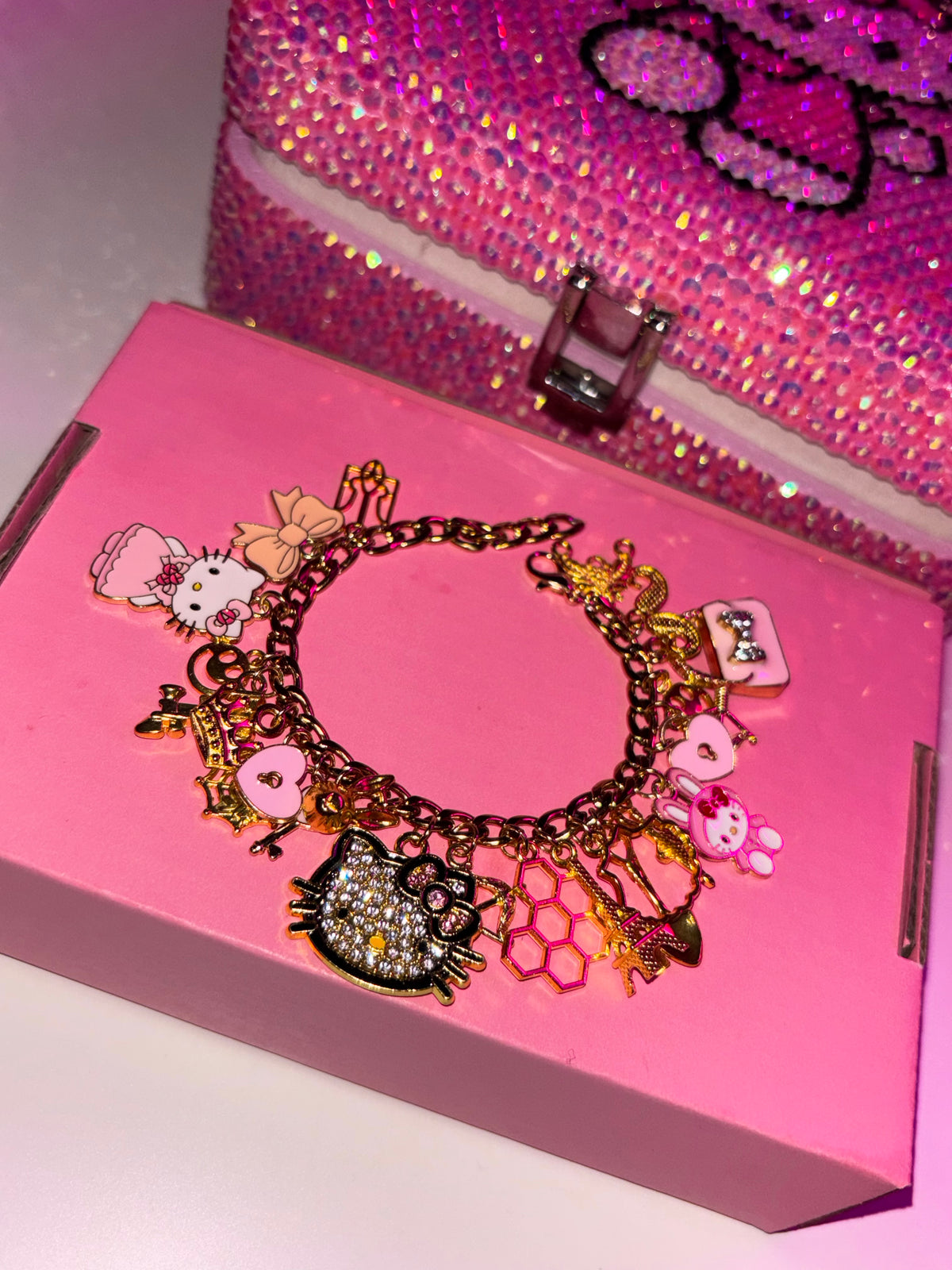Gold & pink HELLO KITTY charm bracelet