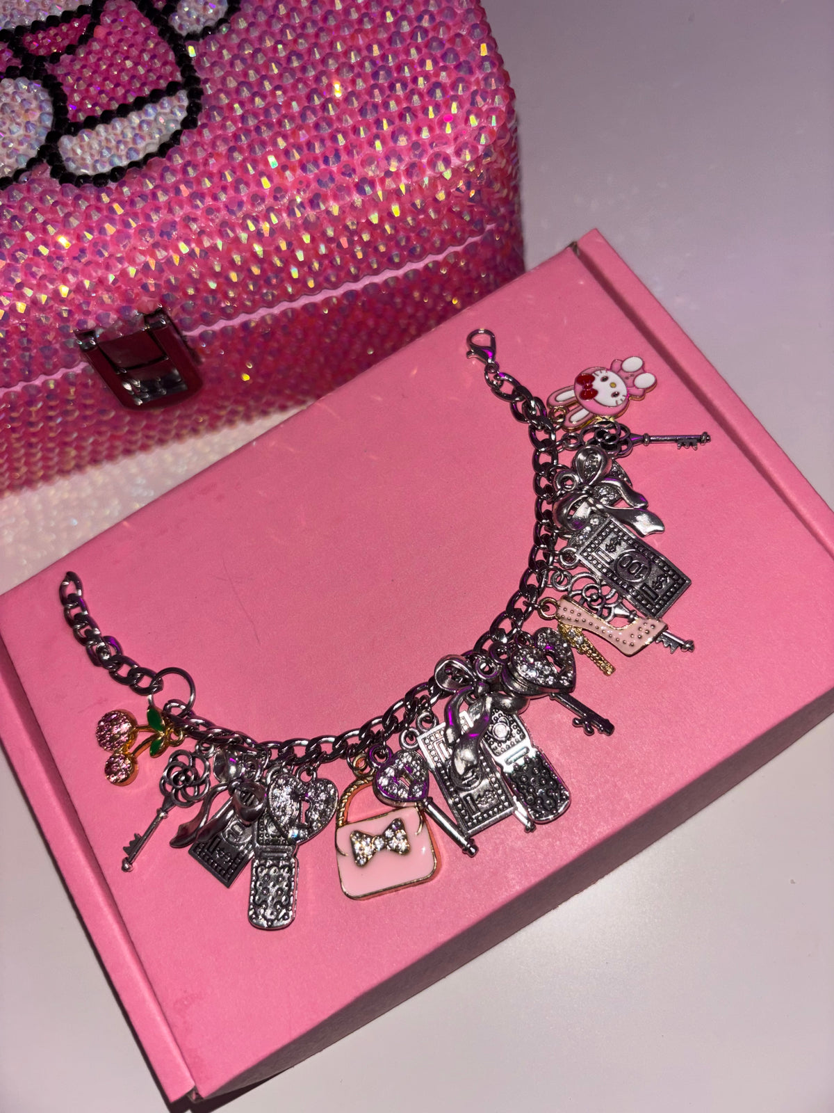 Silver & pink girly charm bracelet